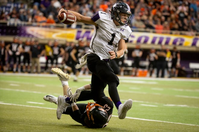 OABCIG's Cooper Dejean (1) runs over Waukon's Tyler Block (23) during their Class 2A state football championship game at the UNI Dome on Friday, Nov. 22, 2019, in Cedar Falls. OABCIG takes a 17-6 lead over Waukon into halftime.