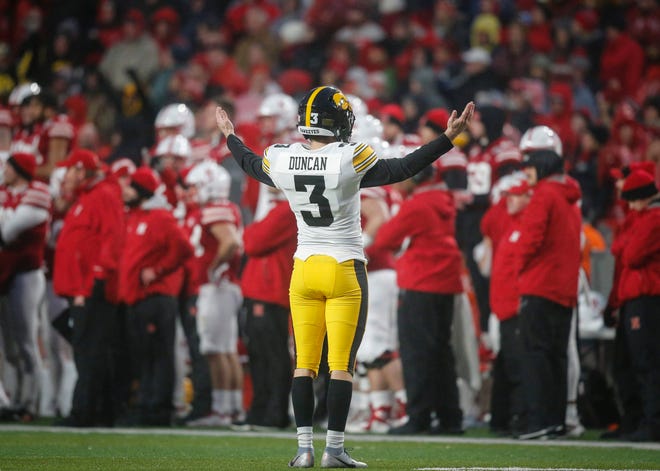 Iowa junior place kicker Keith Duncan blows kisses to the Nebraska sideline after striking a field goal in the final seconds to lead the Hawkeyes to a win over the Cornhuskers on Friday, Nov. 29, 2019, at Memorial Stadium in Lincoln, Neb.