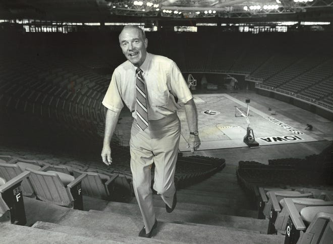 From 1990: Chalmers W. "Bump" Elliott climbs the stairs at Carver-Hawkeye Arena, one of the University of Iowa's accomplishments during his term as athletic director.