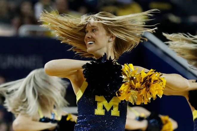 Michigan dancers perform during a timeout in the second half against Iowa at Crisler Center on Friday, Dec. 6, 2019 at the Crisler Center.