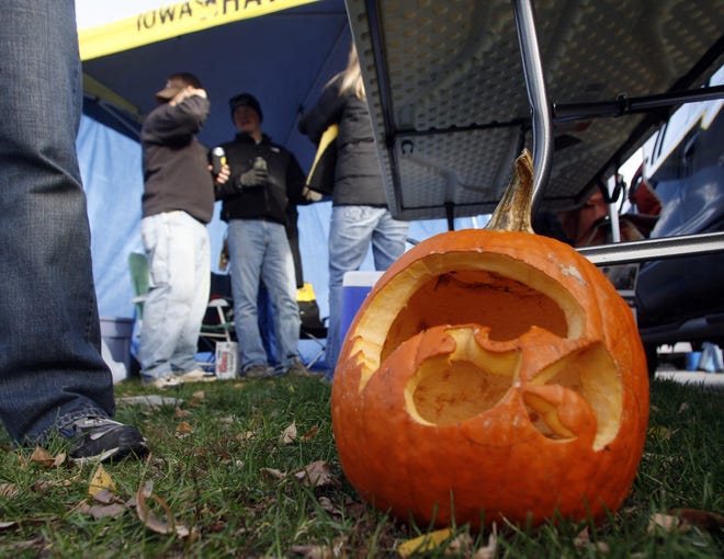 A jack-o-lantern carved with a "Tigerhawk" decorates a tailgate before the Indiana game, Saturday, Oct. 31, 2009, at Kinnick Stadium, in Iowa City, Iowa.