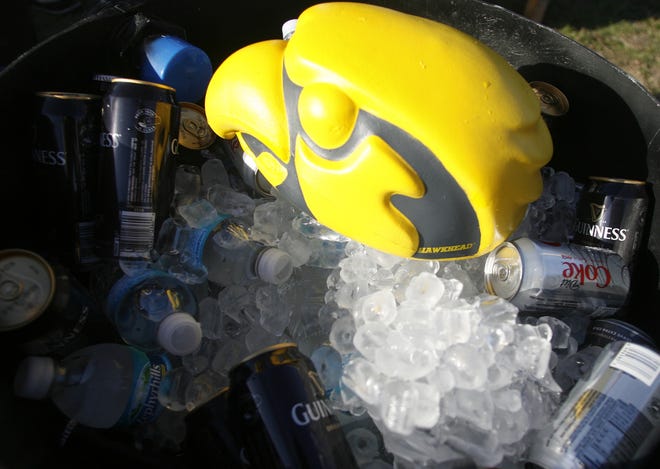 A Tigerhawk helmet sits on top of a cooler of beer and soda as Iowa fans tailgate before the Outback Bowl, Jan. 1, 2009, in Tampa, Fla.