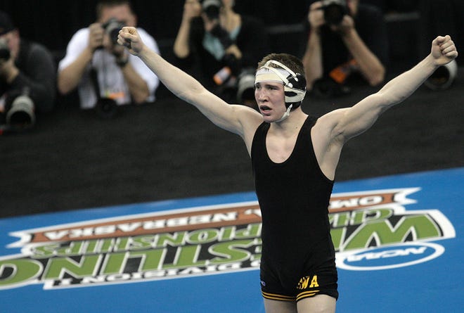 Iowa's Matt McDonough celebrates after beating Iowa State's Andrew Long for an NCAA title in 2010.