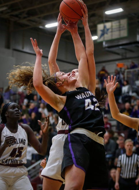 Waukee junior Taryn Reitsma (42) goes up for a rebound against Dowling Catholic senior Caitlin Clark on Tuesday, Jan. 21, 2020, at Dowling Catholic High School in West Des Moines.
