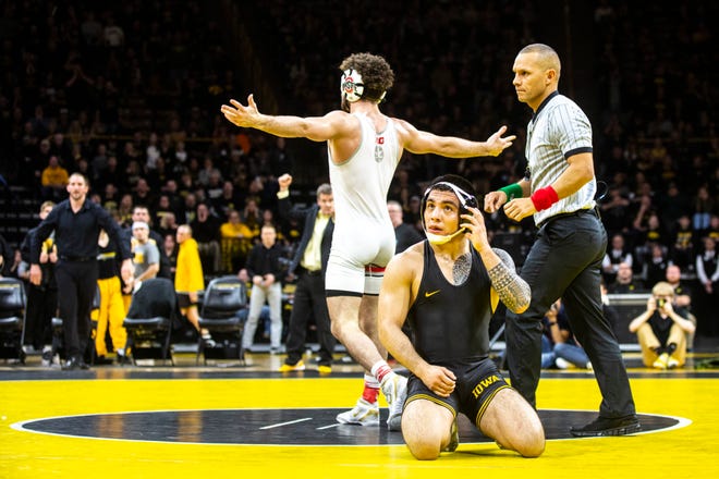 Ohio State's Sammy Sasso reacts after defeating Iowa's Pat Lugo at 149 pounds during a NCAA Big Ten Conference wrestling dual, Friday, Jan. 24, 2020, at Carver-Hawkeye Arena in Iowa City, Iowa.