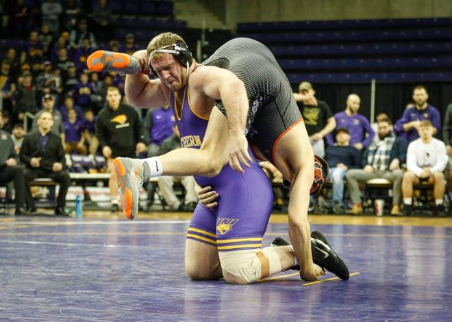 Northern Iowa's Carter Isley dumps Oklahoma State's Austin Harris in their match at 285 pounds on Saturday, Jan. 25, 2020, at the McCleod Center in Cedar Falls.