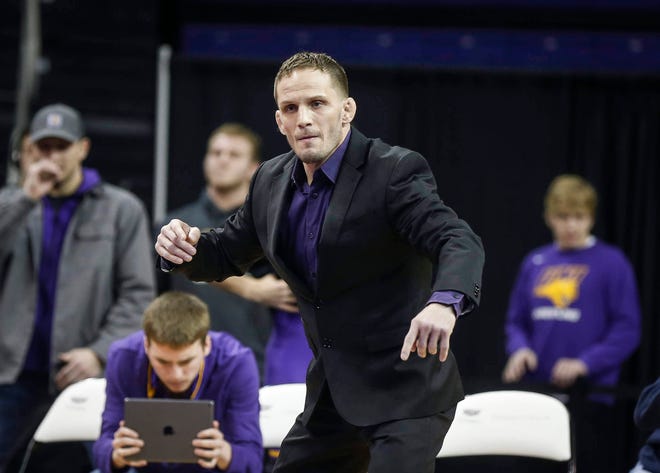 Northern Iowa head wrestling coach Doug Schwab gets animated in the meet against Oklahoma State on Saturday, Jan. 25, 2020, at the McCleod Center in Cedar Falls.