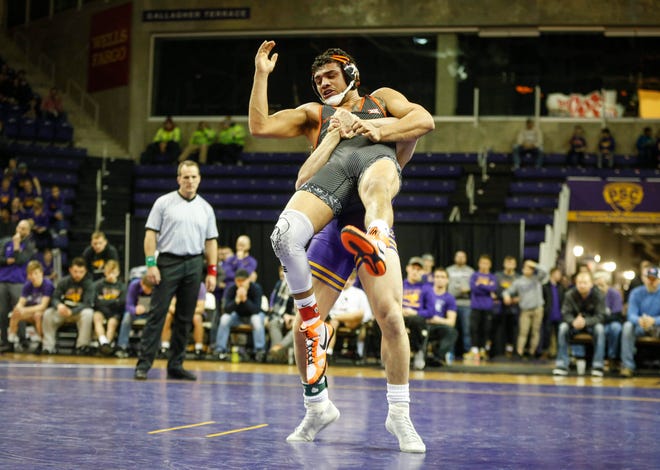 Northern Iowa's Taylor Lujan pulls Oklahoma State's Anthony Montalvo back to the mat in their match at 184 pounds on Saturday, Jan. 25, 2020, at the McCleod Center in Cedar Falls.