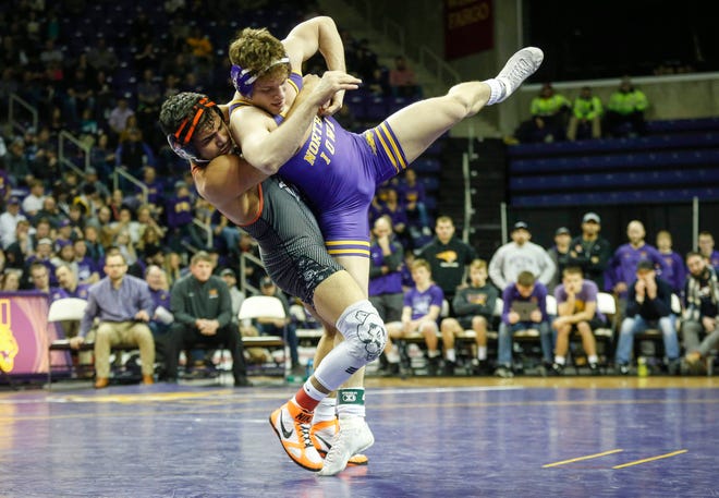 Oklahoma State's Anthony Montalvo pulls Northern Iowa's Taylor Lujan back to the mat in their match at 184 pounds on Saturday, Jan. 25, 2020, at the McCleod Center in Cedar Falls.