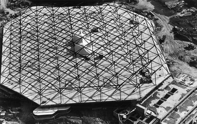 An Aug. 27, 1982, aerial photo of the roof, nicknamed "inverted cow's utter" by a worker at the arena, as well as the office building for staff in the bottom right of the photo, at Carver-Hawkeye Arena in Iowa City, Iowa.
