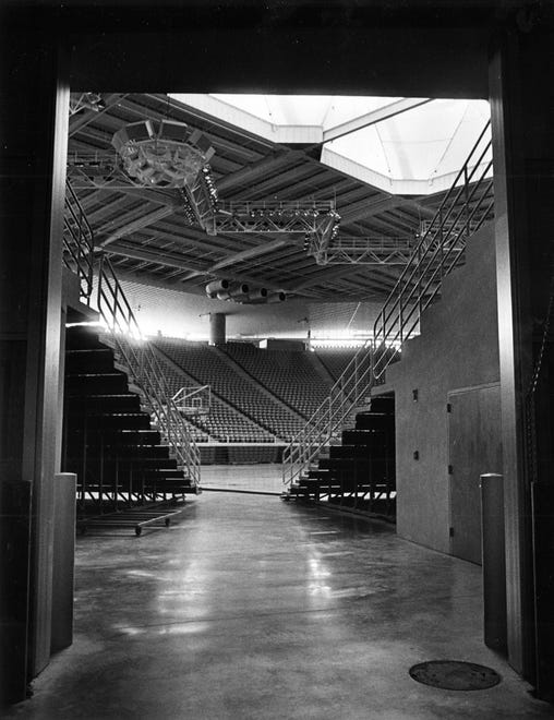 A view looking onto the arena floor from the tunnel in the north west corner of the building, May 4, 1983, at Carver-Hawkeye Arena in Iowa City, Iowa.