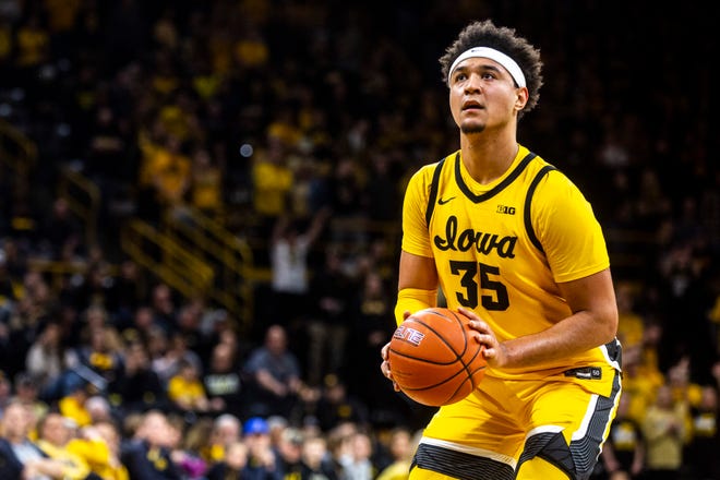 Iowa forward Cordell Pemsl (35) shoots a free throw during a NCAA Big Ten Conference men's basketball game, Saturday, Feb. 8, 2020, at Carver-Hawkeye Arena in Iowa City, Iowa.