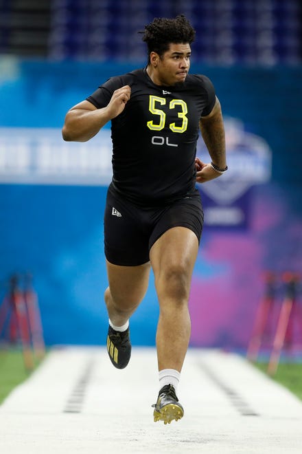 Iowa offensive lineman Tristan Wirfs runs the 40-yard dash at the NFL football scouting combine in Indianapolis, Friday, Feb. 28, 2020.
