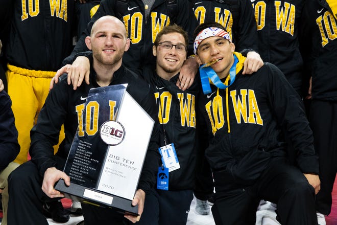 From left: Alex Marinelli, Spencer Lee and Pat Lugo celebrate after winning individual titles at the Big 10 Wrestling Championships March 8, 2020; Piscataway, NJ, USA.