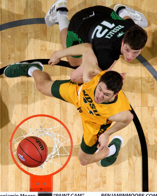 SIOUX FALLS, SD - MARCH 10: Tyler Witz #44 of the North Dakota State Bison has inside position on Filip Rebraca #12 of the North Dakota Fighting Hawks for a rebound during the men’s championship game at the 2020 Summit League Basketball Tournament in Sioux Falls, SD. (Photo by Dave Eggen/Inertia)