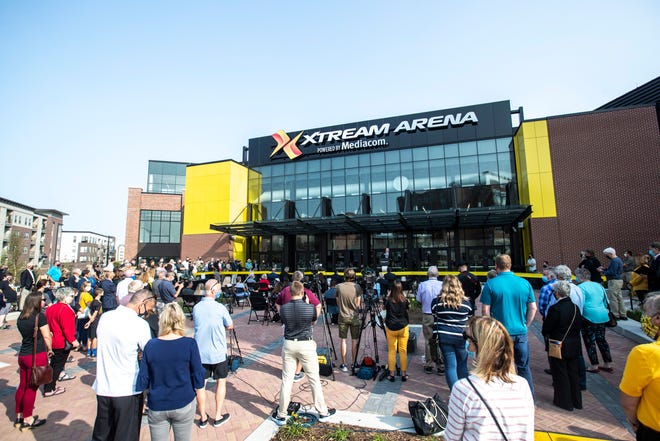 More than one hundred people attend the ribbon cutting event for the Xtream Arena, Thursday, Sept. 17, 2020, at the Iowa River Landing in Coralville, Iowa.