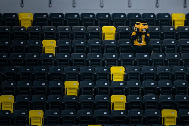 Herky the Hawk, the mascot for the University of Iowa Hawkeyes, sits in a section by itself, Thursday, Sept. 17, 2020, at the Xtream Arena in Coralville, Iowa.