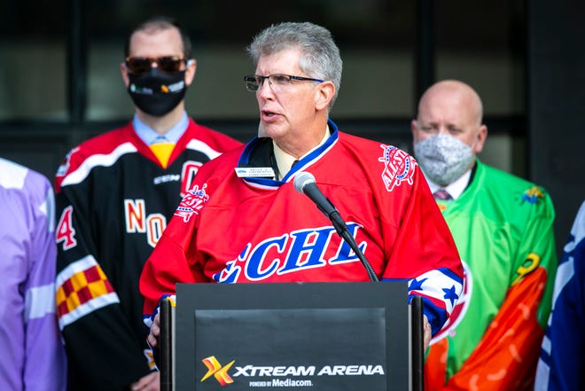 Kelly Hayworth, Coralville city administrator, wears a ECHL hockey jersey while announcing the arena has secured a contract with a team while speaking during a ribbon cutting event, Thursday, Sept. 17, 2020, at the Xtream Arena in Coralville, Iowa.