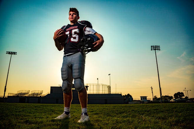 OABCIG quarterback and Iowa Hawkeyes recruit Cooper DeJean stands for a photo on the football field at OABCIG high school in Ida Grove Wednesday, Sept. 23, 2020.
