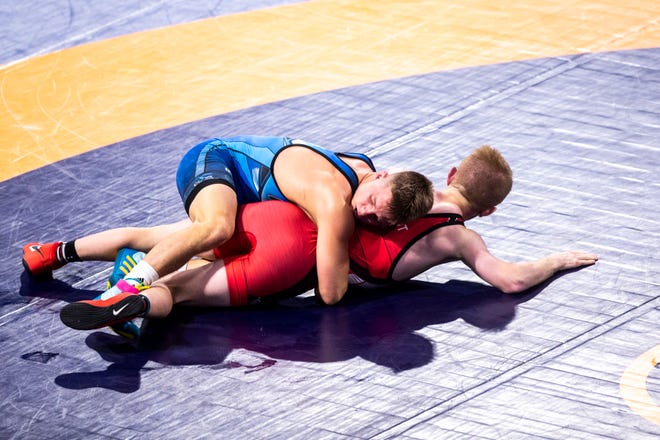 Alex Thomsen, left, wrestles Taylor Lamont at 60kg during the USA Wrestling Senior National Championships, Friday, Oct. 9, 2020, at the Xtream Arena in Coralville, Iowa.