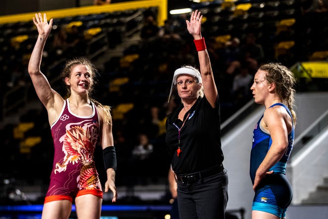 Sarah Hildebrandt, left, reacts after winning the 50kg final against Amy Fearnside during the USA Wrestling Senior National Championships, Friday, Oct. 9, 2020, at the Xtream Arena in Coralville, Iowa.