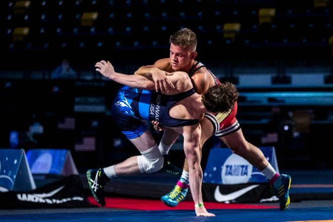 Alex Thomsen, right, wrestles Mosha Schwartz in the 60kg final during the USA Wrestling Senior National Championships, Friday, Oct. 9, 2020, at the Xtream Arena in Coralville, Iowa.