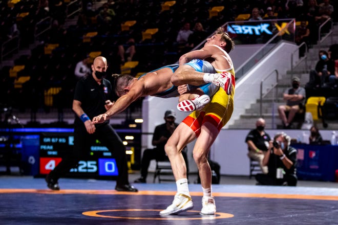 Benji Peak, right, wrestles Calvin Germinaro in the 57kg final during the USA Wrestling Senior National Championships, Friday, Oct. 9, 2020, at the Xtream Arena in Coralville, Iowa.