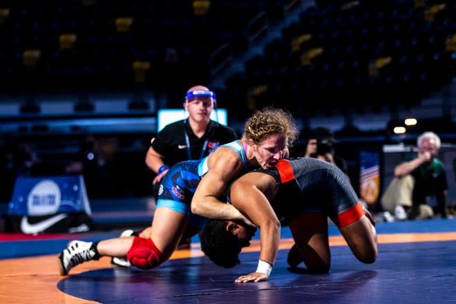 Lauren Louive, left, wrestles Xochitl Mota-Pettis in the 57kg final during the USA Wrestling Senior National Championships, Friday, Oct. 9, 2020, at the Xtream Arena in Coralville, Iowa.