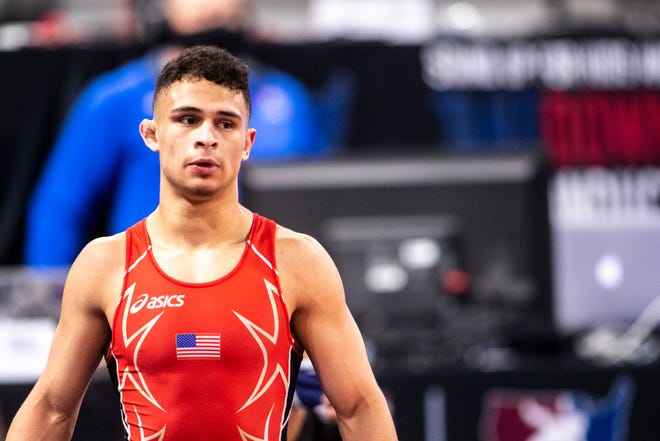 Elijah Varona walks off the mat after a match at 60 kg during the USA Wrestling Senior National Championships, Friday, Oct. 9, 2020, at the Xtream Arena in Coralville, Iowa.