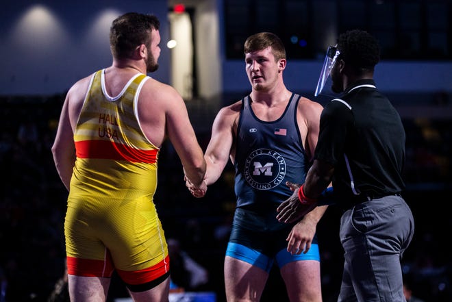 Mason Parris, right, shakes hands with Tanner Hall after their 125 kg final during the USA Wrestling Senior National Championships, Sunday, Oct. 11, 2020, at the Xtream Arena in Coralville, Iowa.