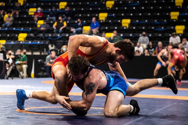 Ian Parker, left, wrestles Nicholas Dardanes at 65 kg during the USA Wrestling Senior National Championships, Saturday, Oct. 10, 2020, at the Xtream Arena in Coralville, Iowa.