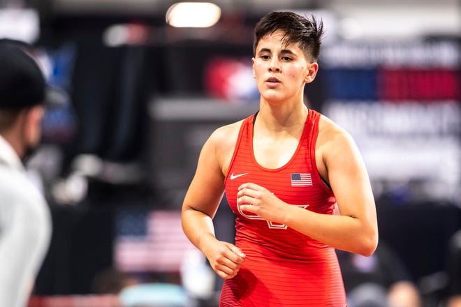 Isabella Gonzalez runs off the mat after a match at 57 kg during the USA Wrestling Senior National Championships, Friday, Oct. 9, 2020, at the Xtream Arena in Coralville, Iowa.