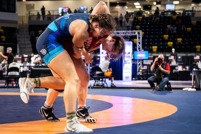 Forrest Molinari, left, wrestles Rachel Watters at 65 kg during the USA Wrestling Senior National Championships, Saturday, Oct. 10, 2020, at the Xtream Arena in Coralville, Iowa.