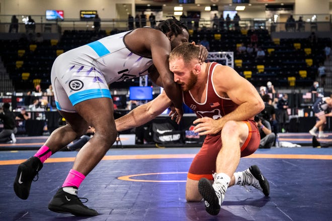 Kyven Gadson, left, wrestles Kyle Snyder at 97 kg during the USA Wrestling Senior National Championships, Saturday, Oct. 10, 2020, at the Xtream Arena in Coralville, Iowa.