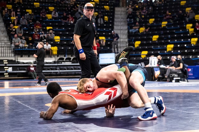 Brody Teske, top, wrestles Britain Longmire at 57 kg during the USA Wrestling Senior National Championships, Saturday, Oct. 10, 2020, at the Xtream Arena in Coralville, Iowa.