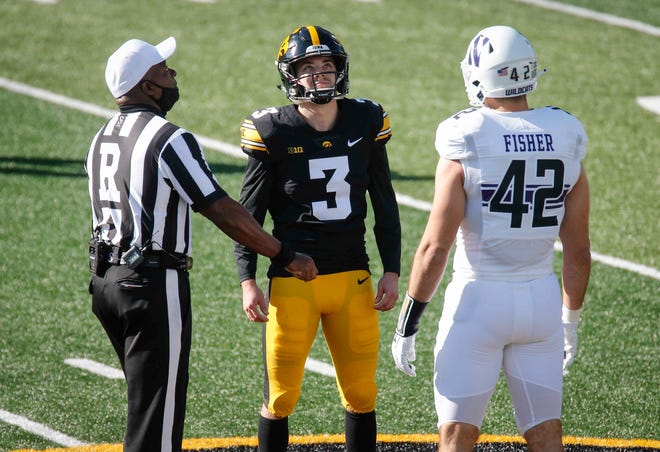 Iowa captain Keith Duncan watches the coin toss prior to kickoff against Northwestern at Kinnick Stadium in Iowa City on Saturday, Oct. 31, 2020.