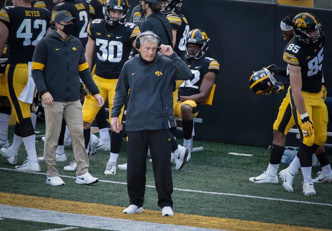 Iowa head football coach Kirk Ferentz looks onto the field after his offense made a play in the third quarter against Northwestern at Kinnick Stadium in Iowa City on Saturday, Oct. 31, 2020.