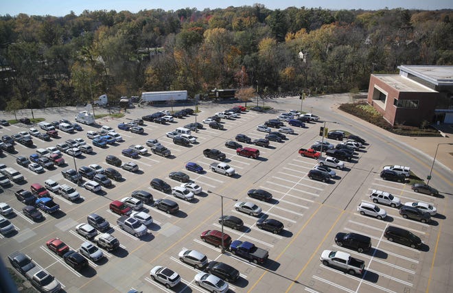 Missing from parking lot 43 at Kinnick Stadium in Iowa City is thousands of Hawkeye fans tailgating and getting fired up for Hawkeyes football, which kicks off against Northwestern at 2:30 p.m. on Saturday, Oct. 31, 2020.
