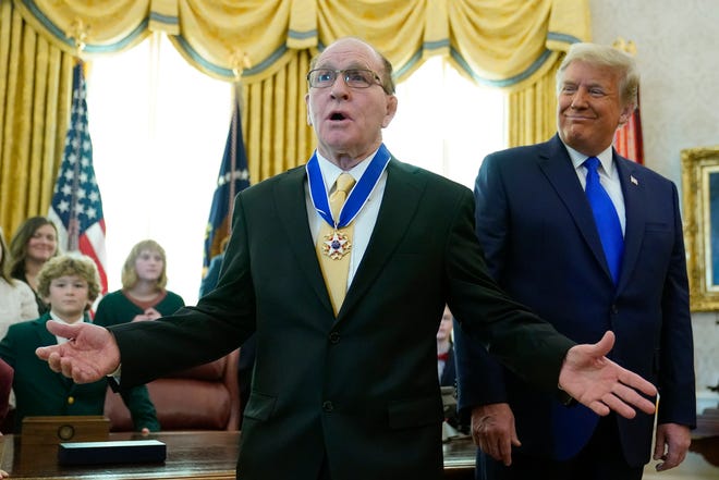 Olympic gold medalist and former University of Iowa wrestling coach Dan Gable speaks after President Donald Trump awarded him the Presidential Medal of Freedom, the highest civilian honor, in the Oval Office of the White House, Monday, Dec. 7, 2020, in Washington.