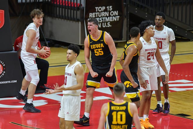Jan 2, 2021; Piscataway, New Jersey, USA; Iowa Hawkeyes center Luka Garza (55) reacts during a game against the Rutgers Scarlet Knights during the second half at Rutgers Athletic Center (RAC). Mandatory Credit: Catalina Fragoso-USA TODAY Sports