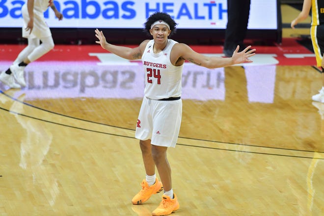 Jan 2, 2021; Piscataway, New Jersey, USA; Rutgers Scarlet Knights guard Ron Harper Jr. (24) reacts during a game against the Iowa Hawkeyes during the first half at Rutgers Athletic Center (RAC). Mandatory Credit: Catalina Fragoso-USA TODAY Sports