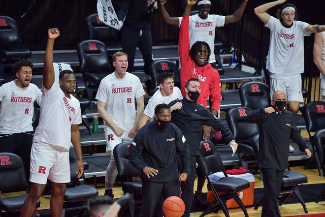 Jan 2, 2021; Piscataway, New Jersey, USA; Rutgers Scarlet Knights bench reacts during a game against the Iowa Hawkeyes during the second half at Rutgers Athletic Center (RAC). Mandatory Credit: Catalina Fragoso-USA TODAY Sports