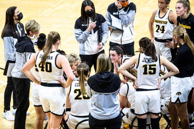 Iowa head coach Lisa Bluder talks with players in a timeout during a NCAA Big Ten Conference women's basketball game against Minnesota, Wednesday, Jan. 6, 2021, at Carver-Hawkeye Arena in Iowa City, Iowa.