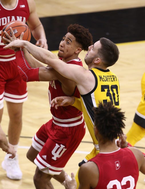 Guard Rob Phinisee #10 of the Indiana Hoosiers goes to the basket in the first half against guard Connor McCaffery #30 of the Iowa Hawkeyes on January 21, 2021, at Carver-Hawkeye Arena in Iowa City.