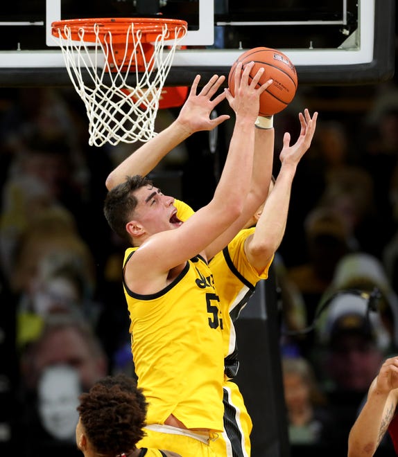 Iowa Hawkeyes center Luka Garza (55) grabs a rebound against the Indiana Hoosiers Thursday, January 21, 2021 at Carver-Hawkeye Arena.