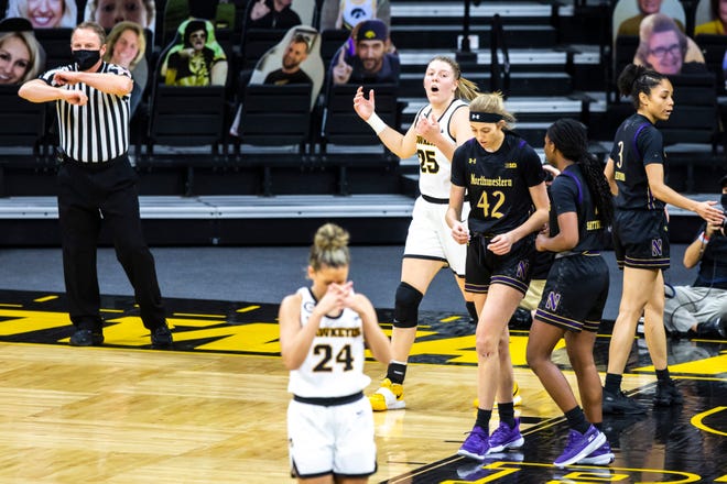 Iowa center Monika Czinano (25) reacts after getting called for a travel during the first half of a NCAA Big Ten Conference women's basketball game against Northwestern, Thursday, Jan. 28, 2021, at Carver-Hawkeye Arena in Iowa City, Iowa.