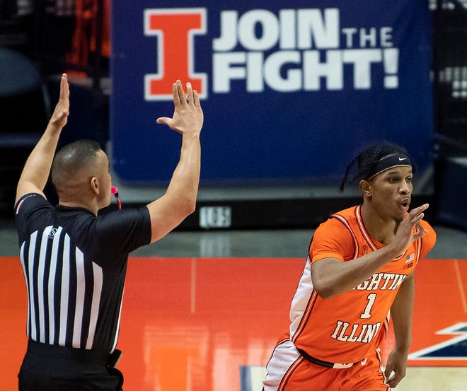 Jan 29, 2021; Champaign, Illinois, USA; Illinois Fighting Illini guard Trent Frazier (1) celebrates after making a three point basket against the Iowa Hawkeyes during the second half at the State Farm Center.