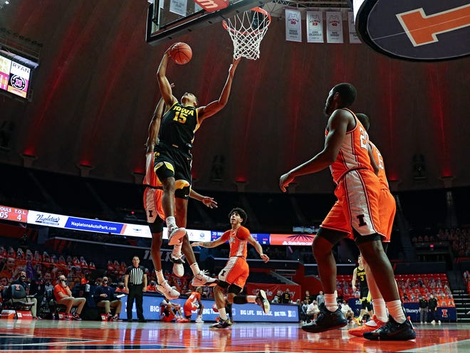 Iowa Hawkeyes forward Keegan Murray (15) battles for a rebound during the first half of their game against the Illinois Fighting Illini, Friday, Jan. 29, 2021, at the State Farm Center in Champaign, Illinois.