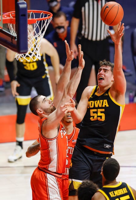 CHAMPAIGN, IL - JANUARY 29: Luka Garza #55 of the Iowa Hawkeyes shoots the ball against Giorgi Bezhanishvili #15 of the Illinois Fighting Illini during the first half at State Farm Center on January 29, 2021 in Champaign, Illinois. (Photo by Michael Hickey/Getty Images)
