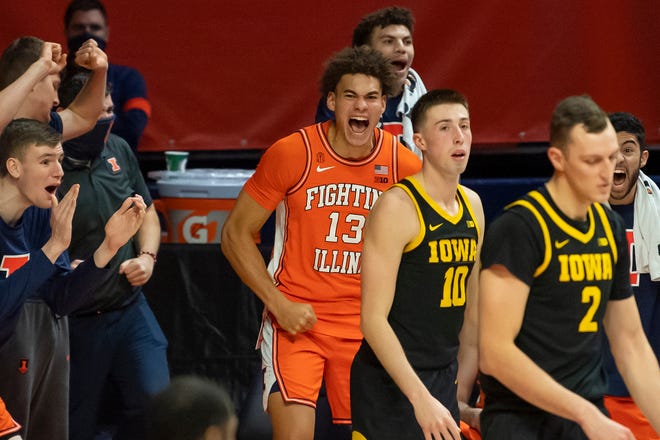 Jan 29, 2021; Champaign, Illinois, USA; Illinois Fighting Illini forward Benjamin Bosmans-Verdonk (13) and the Fighting Illini bench celebrate during the second half against the Iowa Hawkeyes at the State Farm Center.